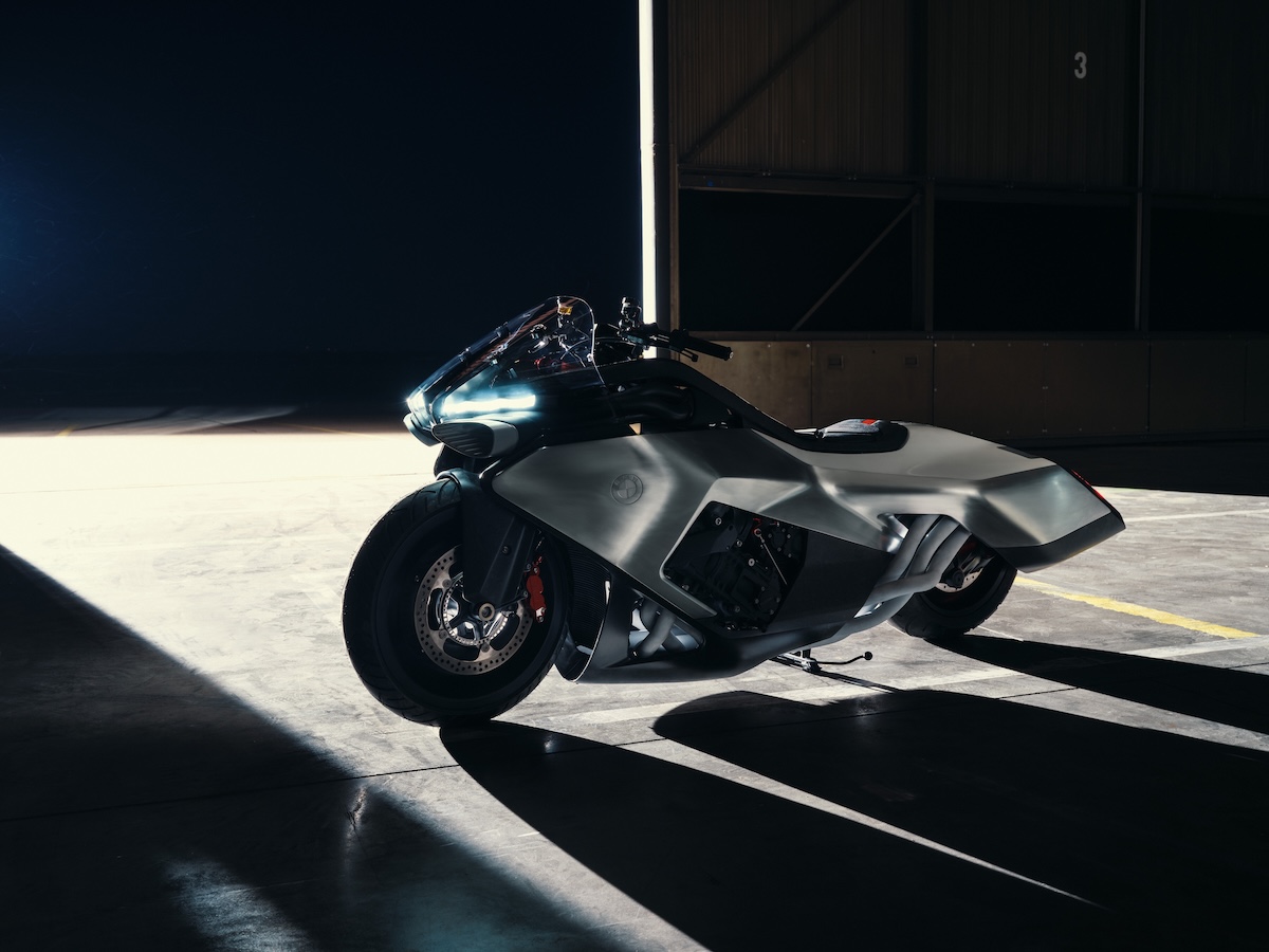 BMW Motorrad Vision K18 front quarter view in hangar with hand-planished aluminum bodywork
