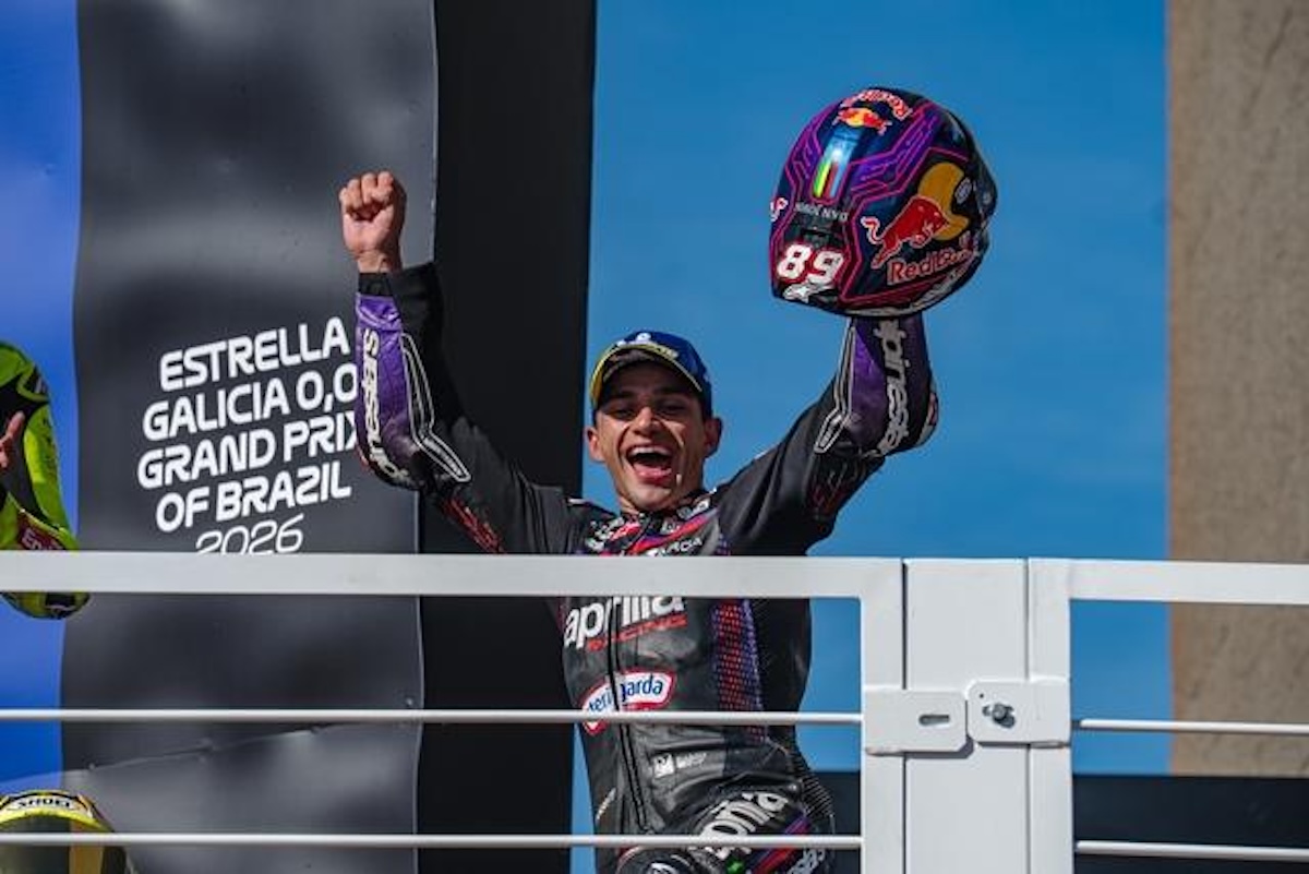 Jorge Martin raises his Red Bull helmet on the Brazilian MotoGP 2026 podium at Goiania