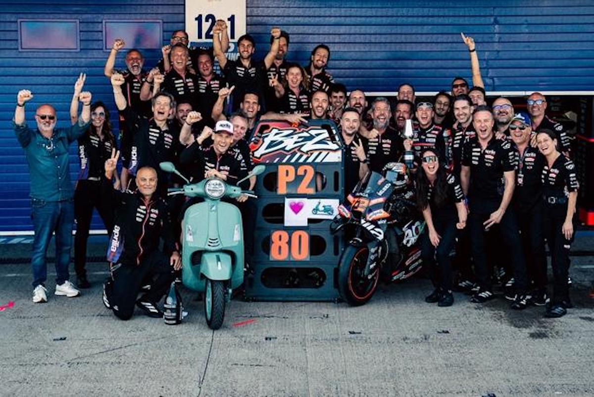 Aprilia Racing celebrates a P2 finish at the Spanish MotoGP 2026 with a Vespa 80th anniversary scooter on track at Jerez