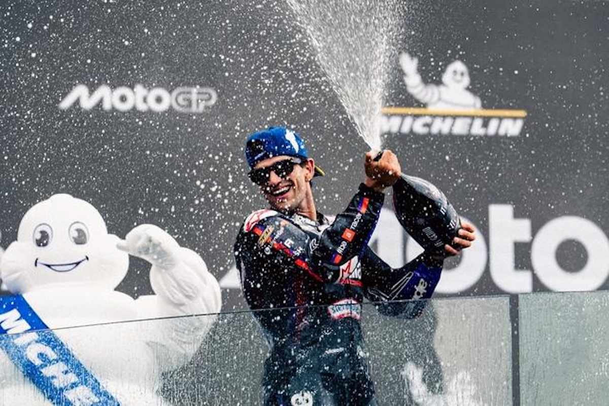 Jorge Martin sprays champagne on the French MotoGP 2026 podium at Le Mans